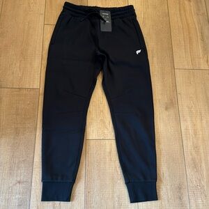 Fabletics men’s the go-to jogger in black size medium